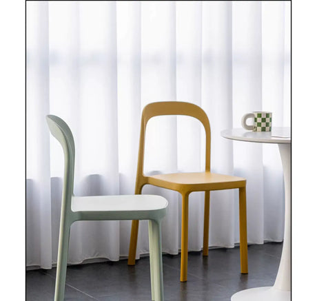ABOUT WHITE Evangeline Minimalist Plastic Chair for Small Spaces from ABOUT WHITE