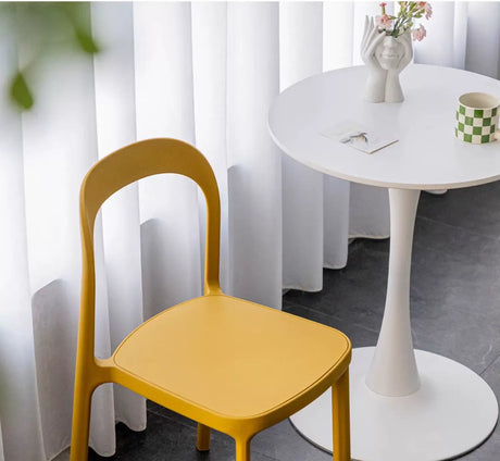 ABOUT WHITE Evangeline Minimalist Plastic Chair for Small Spaces from ABOUT WHITE