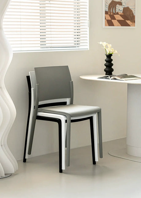 ABOUT WHITE Hiroshi Ergonomic Stackable Plastic Dining Chair from ABOUT WHITE