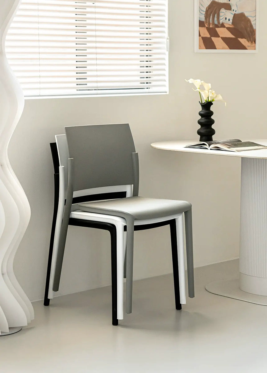 ABOUT WHITE Hiroshi Ergonomic Stackable Plastic Dining Chair from ABOUT WHITE