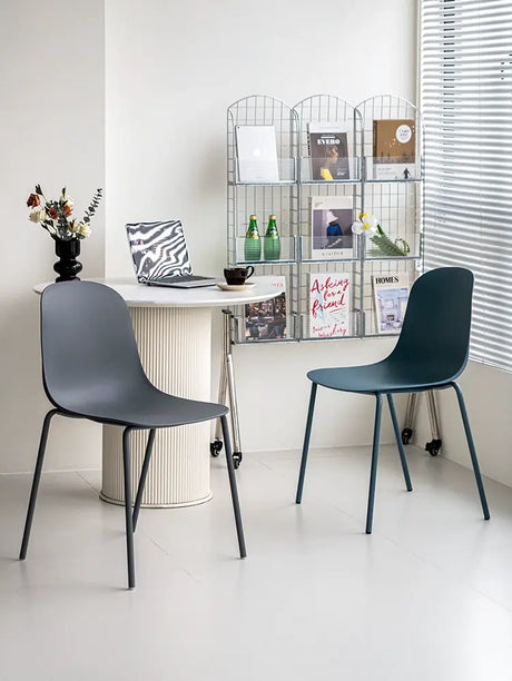 ABOUT WHITE Isolde Minimalist Stackable Dining Chair from ABOUT WHITE