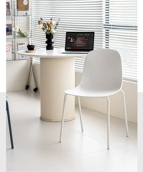 ABOUT WHITE Isolde Minimalist Stackable Dining Chair from ABOUT WHITE