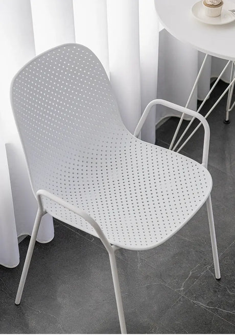ABOUT WHITE Marcellus Sleek Armrest Plastic Dining Chair from ABOUT WHITE