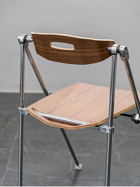 ABOUT WHITE Marcellus Sleek Folding Dining Chair from ABOUT WHITE
