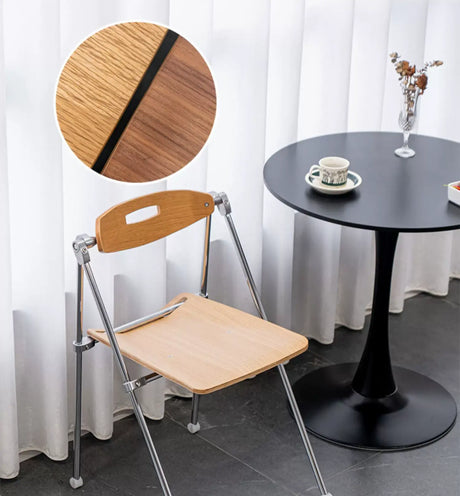 ABOUT WHITE Marcellus Sleek Folding Dining Chair from ABOUT WHITE