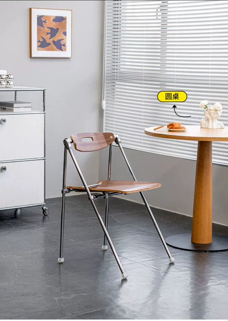 ABOUT WHITE Marcellus Sleek Folding Dining Chair from ABOUT WHITE