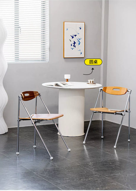ABOUT WHITE Marcellus Sleek Folding Dining Chair from ABOUT WHITE