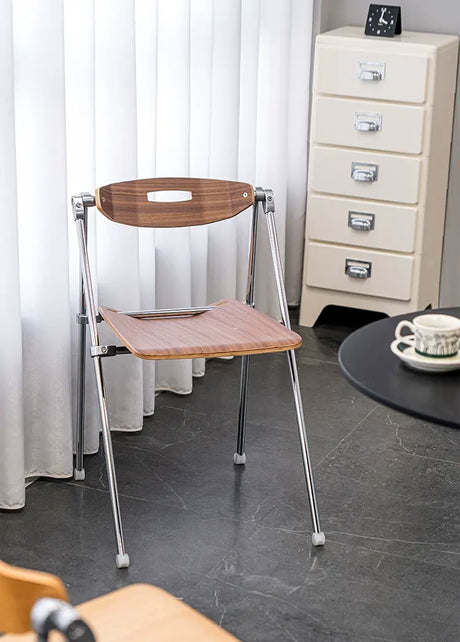 ABOUT WHITE Marcellus Sleek Folding Dining Chair from ABOUT WHITE
