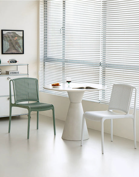 ABOUT WHITE Marisol Sleek Ergonomic Dining Chair from ABOUT WHITE