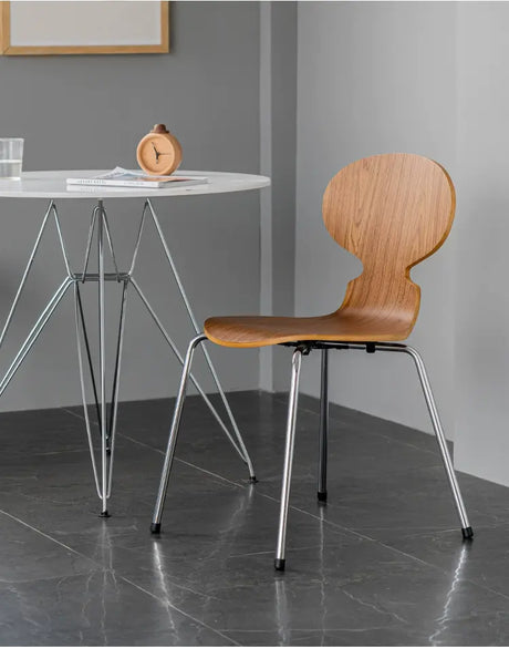 ABOUT WHITE Mercutio Sleek Iron Dining Chair from ABOUT WHITE