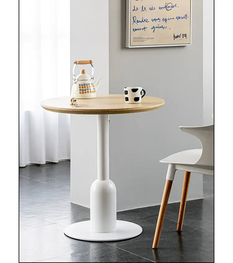 ABOUT WHITE Orenji Elegant Solid Wood Round Dining Table from ABOUT WHITE