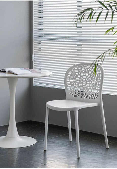 ABOUT WHITE Santiago Minimalist Hollow-Back Dining Chair from ABOUT WHITE