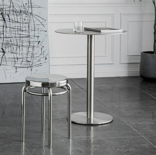 ABOUT WHITE Santiago Sleek Stainless Steel Round Dining Table from ABOUT WHITE