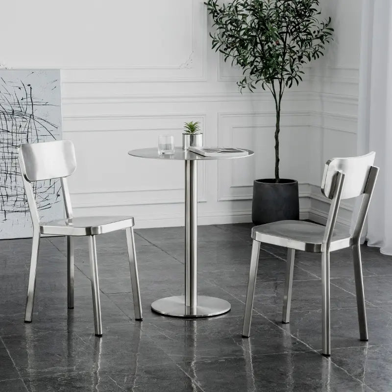 ABOUT WHITE Santiago Sleek Stainless Steel Round Dining Table from ABOUT WHITE