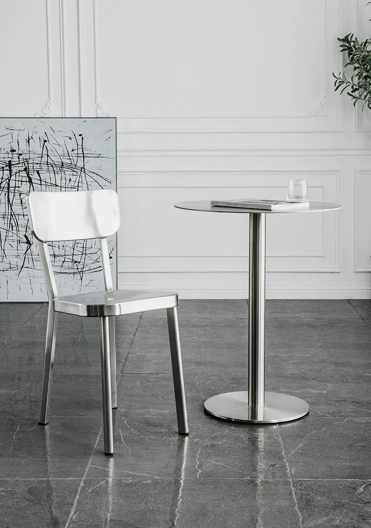 ABOUT WHITE Santiago Sleek Stainless Steel Round Dining Table from ABOUT WHITE