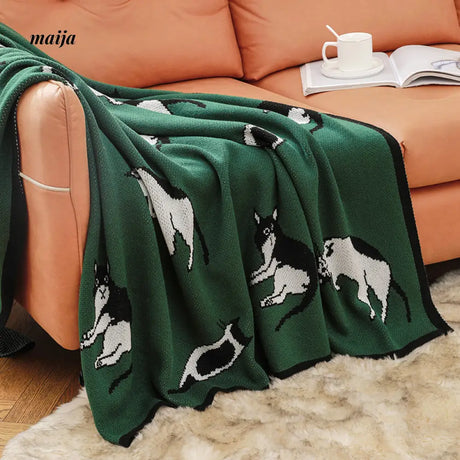 Lounging Cat Green Retro Blanket from maija