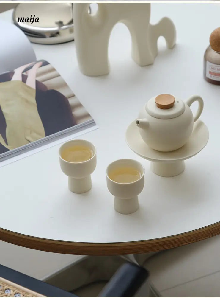 High Foot Creamy Ceramic Tea Set from maija