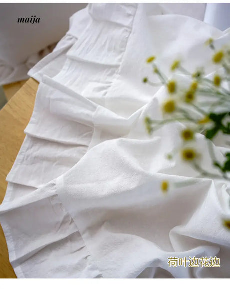 White Ruffle Linen Tablecloth from maija