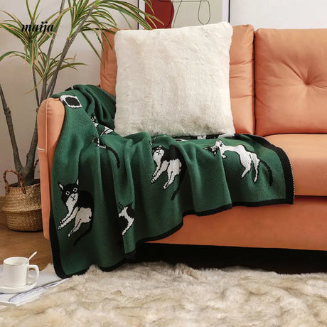 Lounging Cat Green Retro Blanket from maija