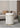 APARTMENT NO.7 Evelyn Chic Leather Round Stool from APARTMENT NO.7