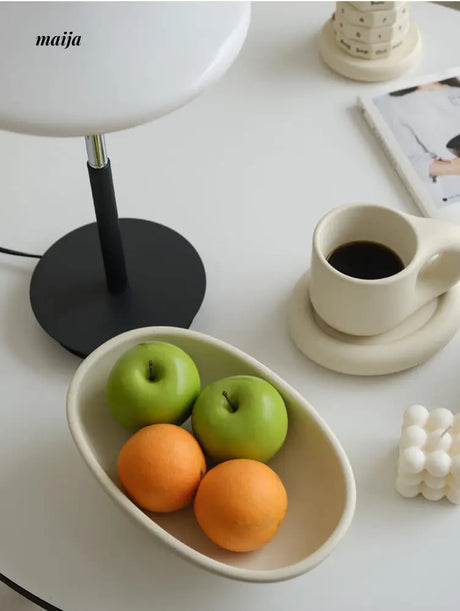 Three-Legged Ceramic Fruit Bowl from maija