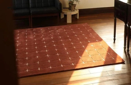 UNDERLAND Quilted Oyster Theater Rug from UNDERLAND