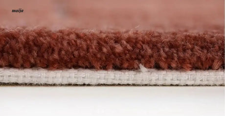 UNDERLAND Quilted Oyster Theater Rug from UNDERLAND