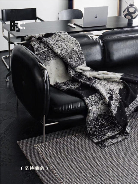 TELLS Marcellus Elegant Vintage Black Leather Sofa with Stainless Steel Accents from TELLS