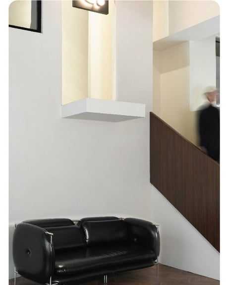 TELLS Marcellus Elegant Vintage Black Leather Sofa with Stainless Steel Accents from TELLS