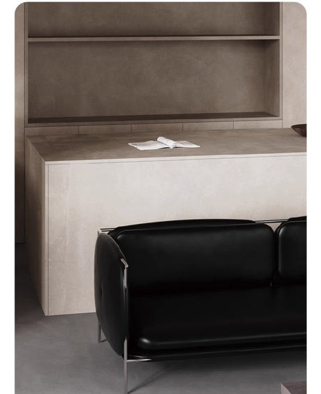 TELLS Marcellus Elegant Vintage Black Leather Sofa with Stainless Steel Accents from TELLS