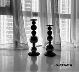 Black Metal Sphere Candle Holders from GUJAMA