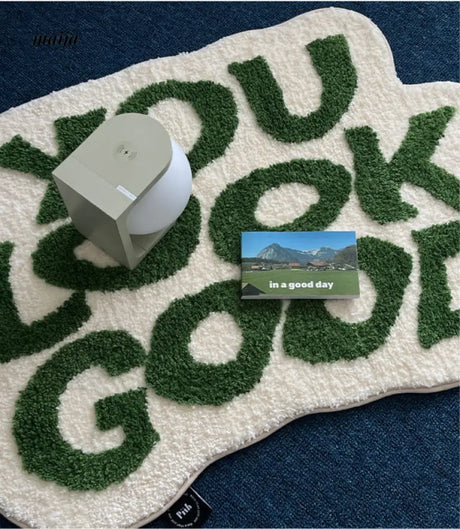 YOU LOOK GOOD Bath Mat from maija
