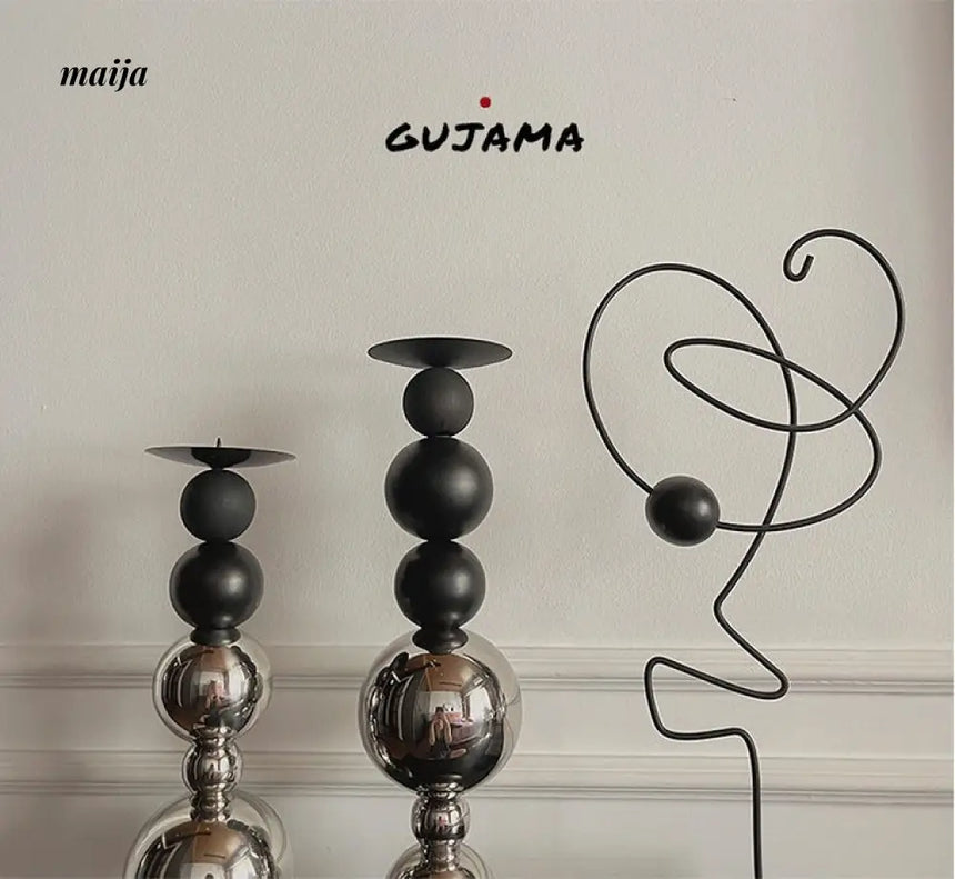 Black Metal Sphere Candle Holders from GUJAMA