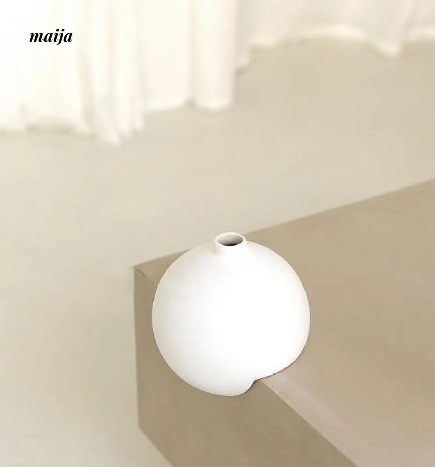 Right Angle Spherical Ceramic Vase from maija
