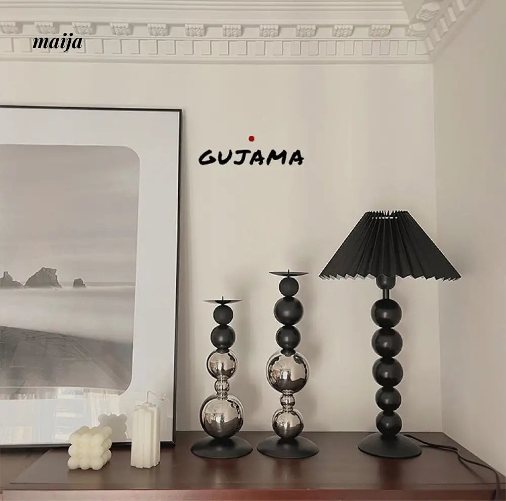 Black Metal Sphere Candle Holders from GUJAMA