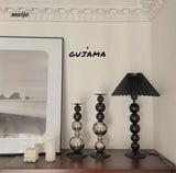 Black Metal Sphere Candle Holders from GUJAMA
