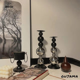 Black Metal Sphere Candle Holders from GUJAMA