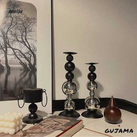 Black Metal Sphere Candle Holders from GUJAMA