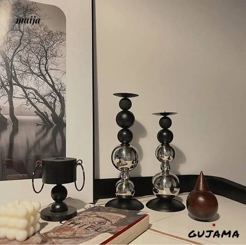 Black Metal Sphere Candle Holders from GUJAMA