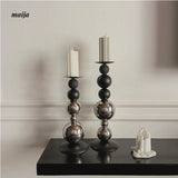 Black Metal Sphere Candle Holders from GUJAMA