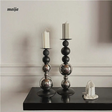 Black Metal Sphere Candle Holders from GUJAMA