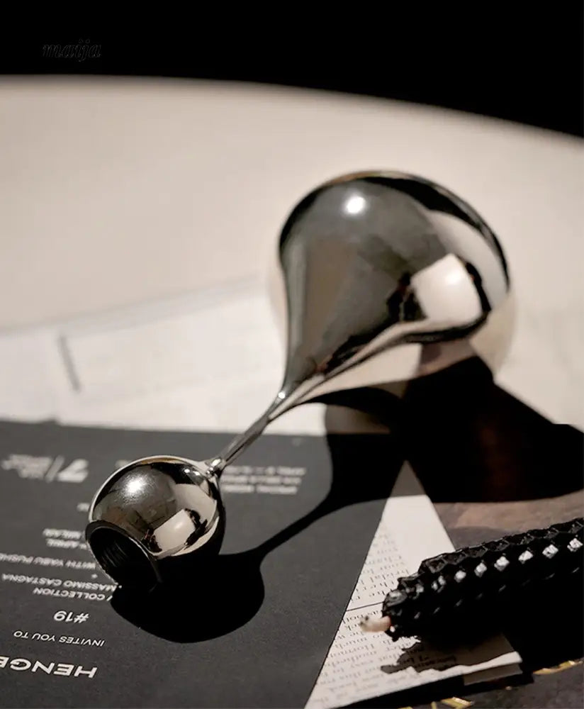 Teardrop Stainless Steel Candle Holder Set from maija