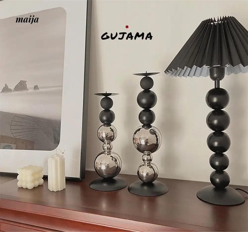 Black Metal Sphere Candle Holders from GUJAMA