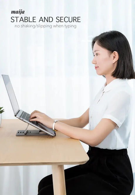 Adjustable Metal Laptop Stand from llano/Green Giant